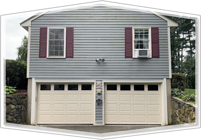 residence with cream garage door