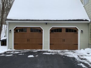 double residential garage door with wood finish