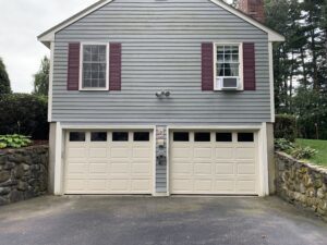 steel cream garage doors on home